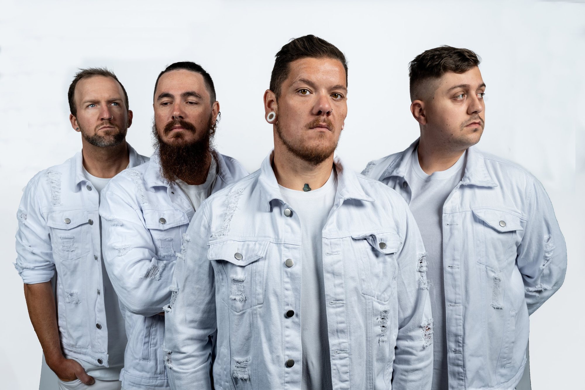 New Anomaly band portrait in white against a light backdrop